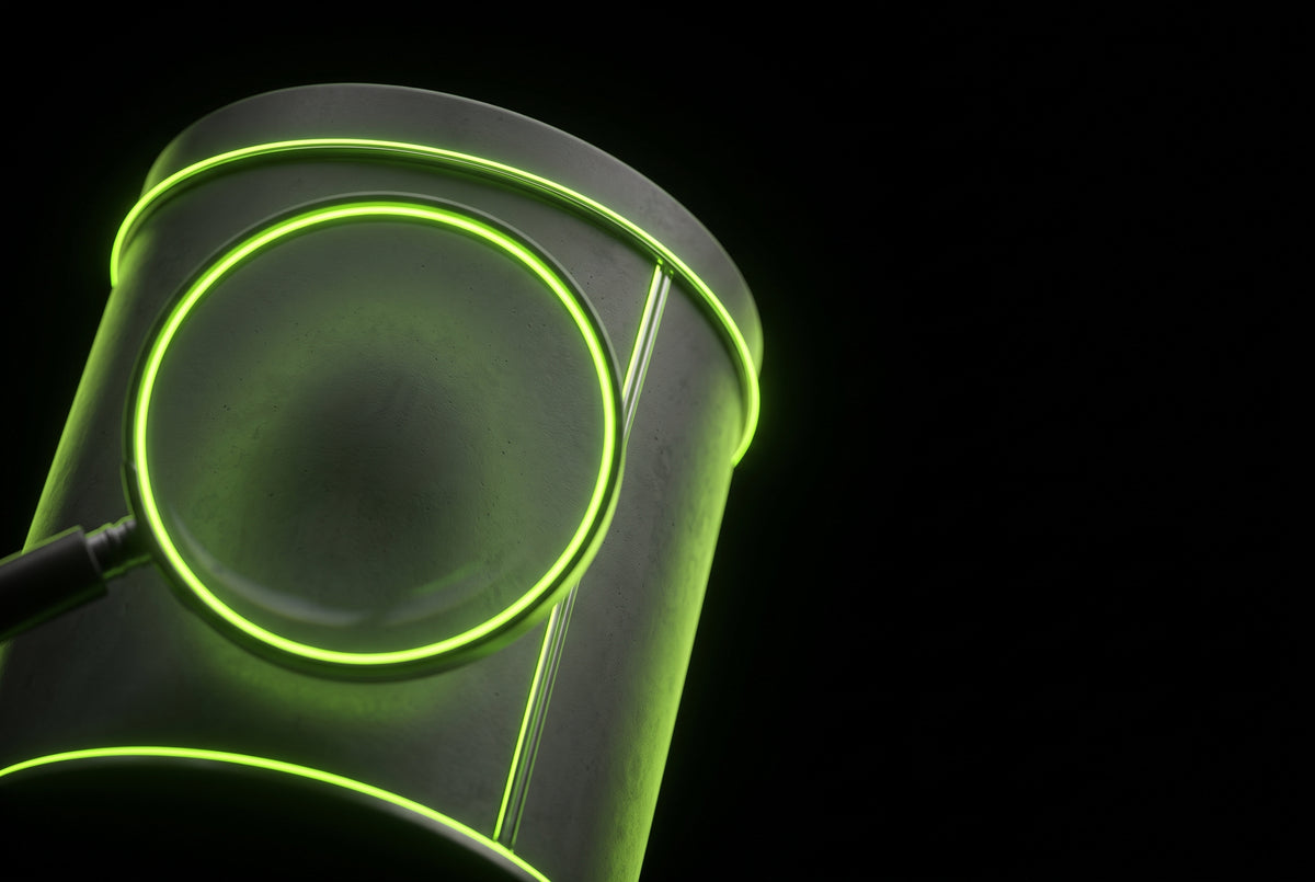 Magnifying lens over a pouch tin outlined in green neon - reading a caffeine label